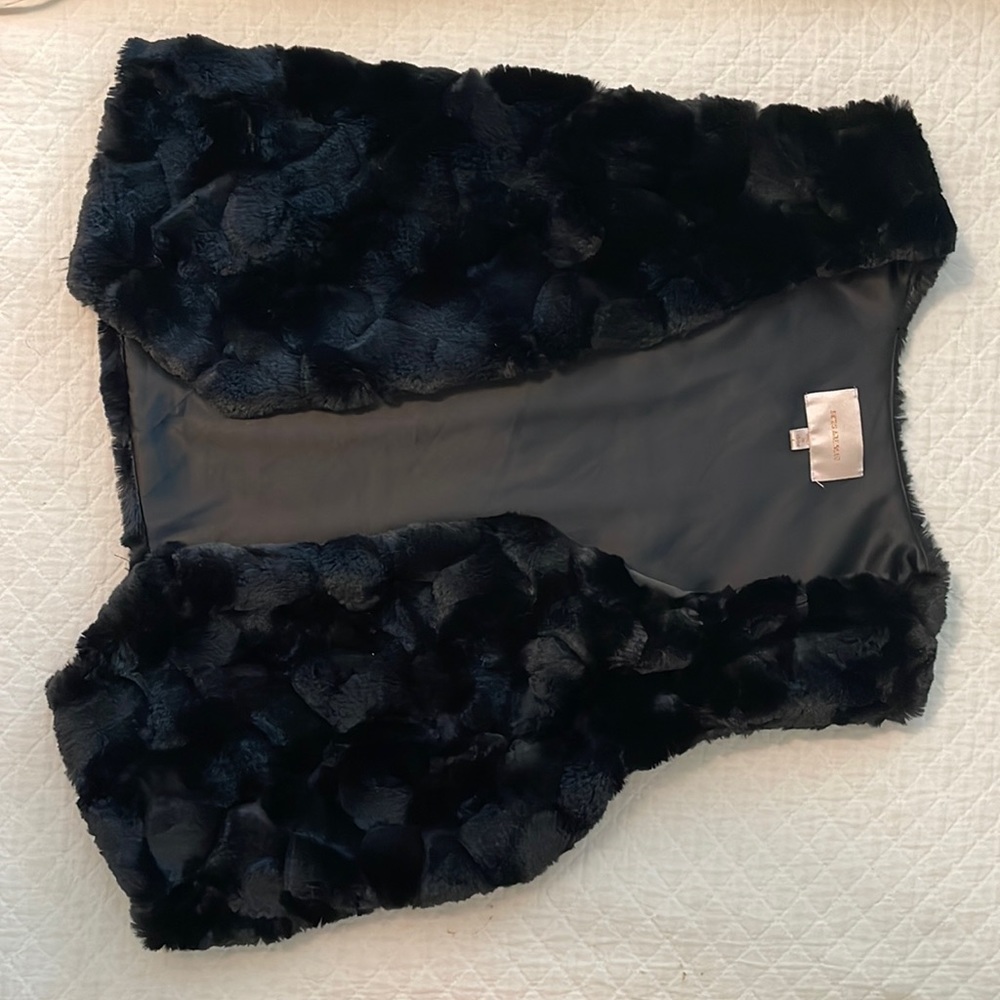 Black faux fur vest